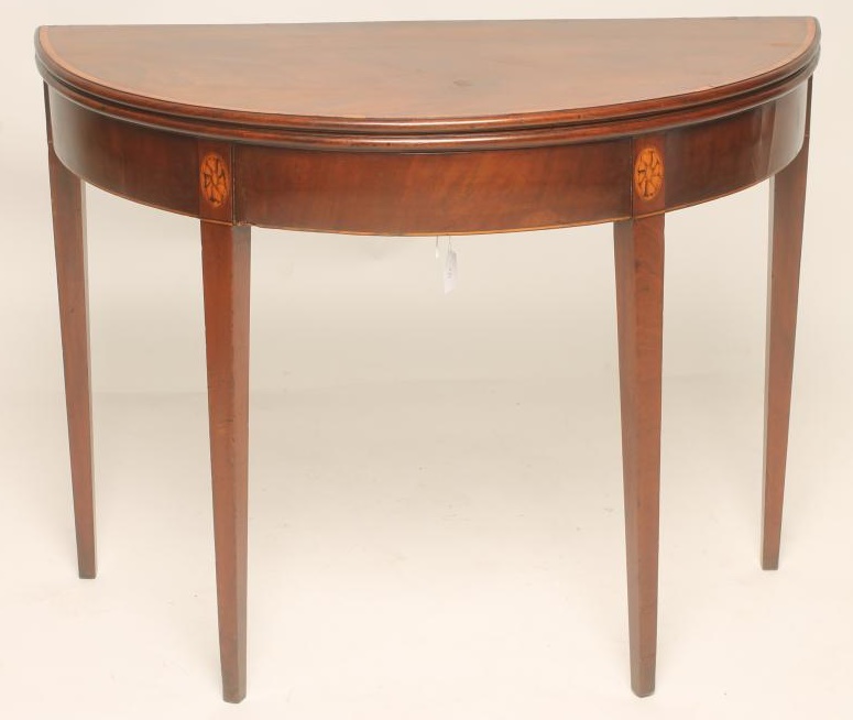 A GEORGIAN MAHOGANY FOLDING TEA TABLE Image