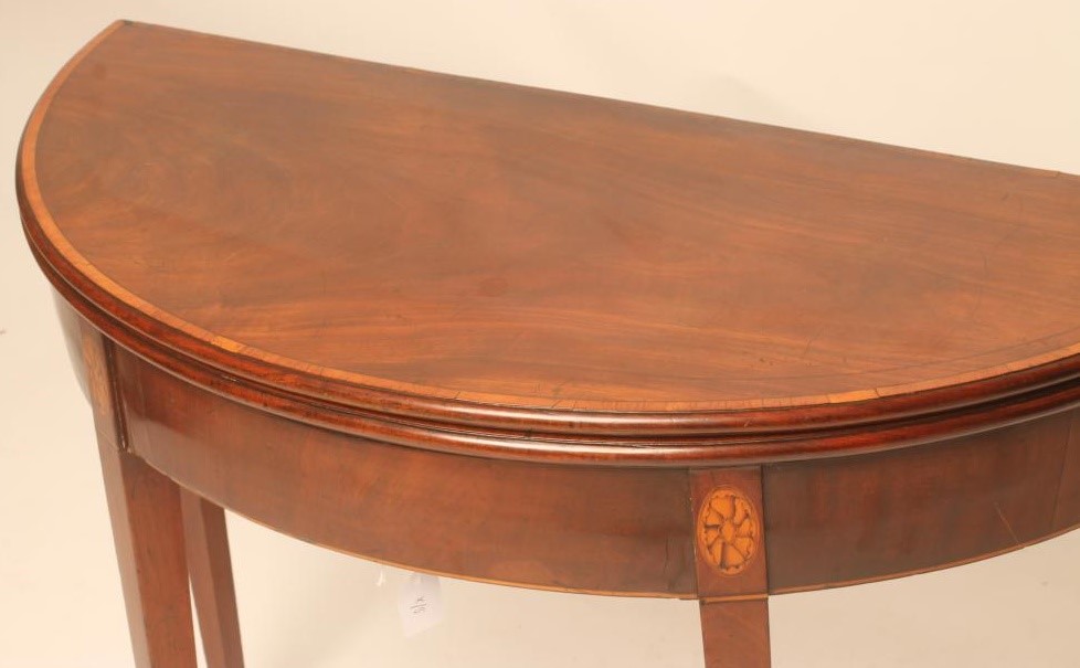 A GEORGIAN MAHOGANY FOLDING TEA TABLE Image