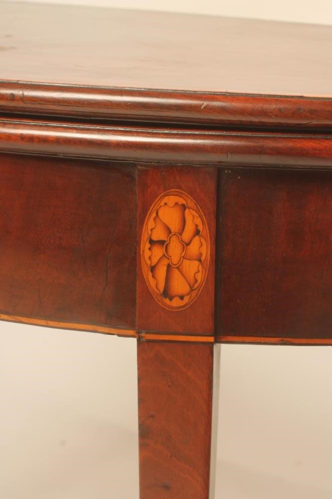 A GEORGIAN MAHOGANY FOLDING TEA TABLE Image