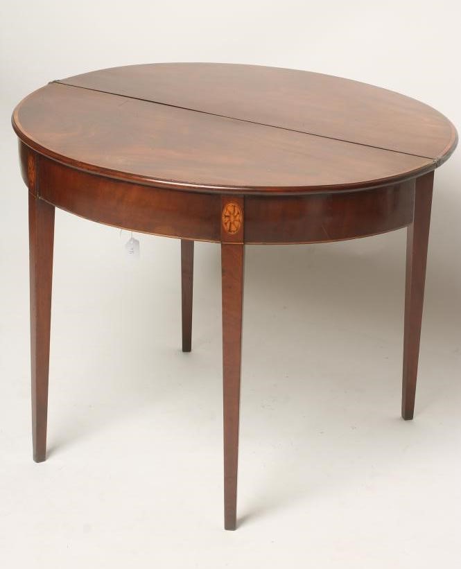 A GEORGIAN MAHOGANY FOLDING TEA TABLE Image