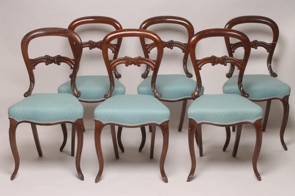 A SET OF SIX VICTORIAN ROSEWOOD DINING CHAIRS of balloon back form upholstered in turquoise weave Image