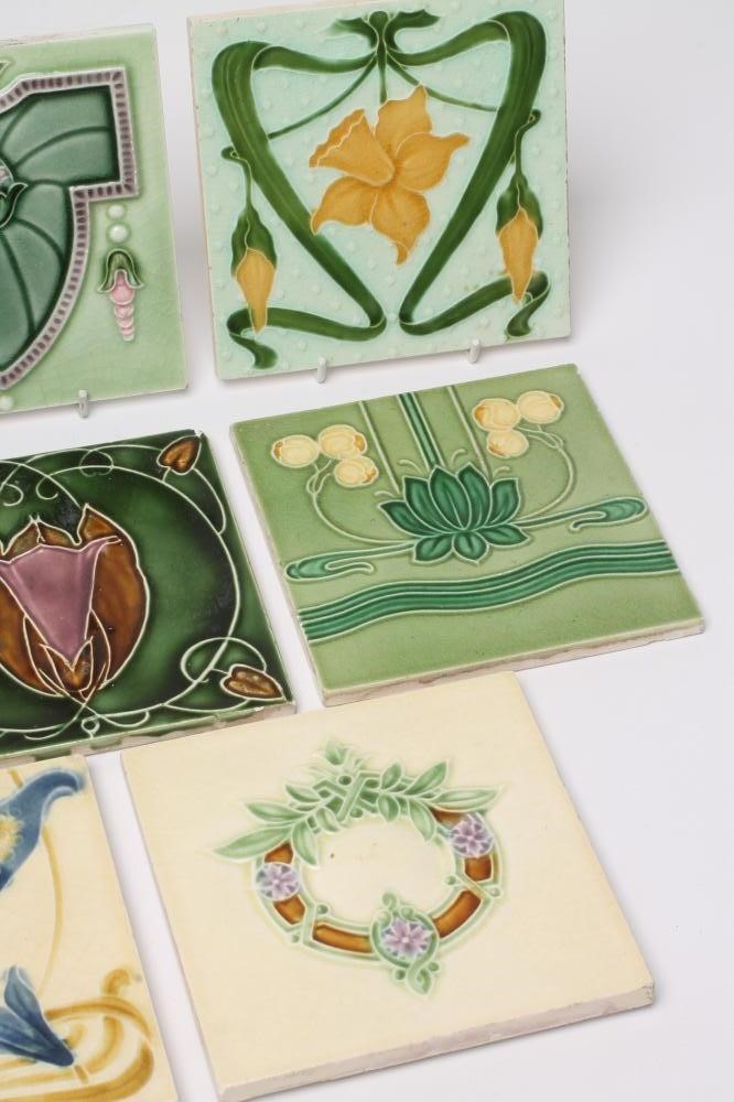 A COLLECTION OF ELEVEN ART NOUVEAU TILES Image