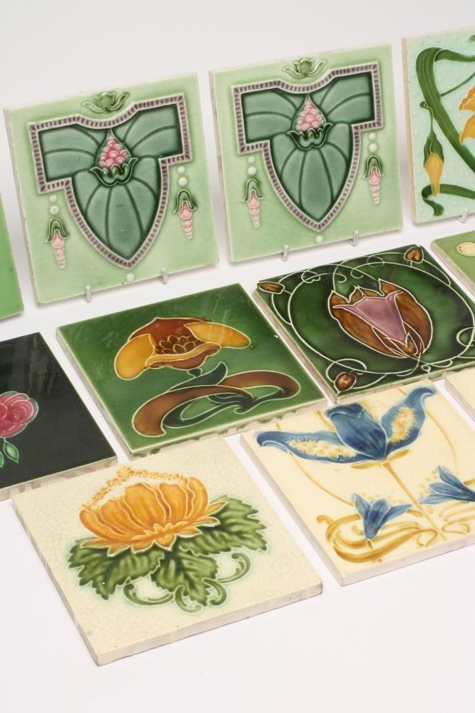 A COLLECTION OF ELEVEN ART NOUVEAU TILES Image