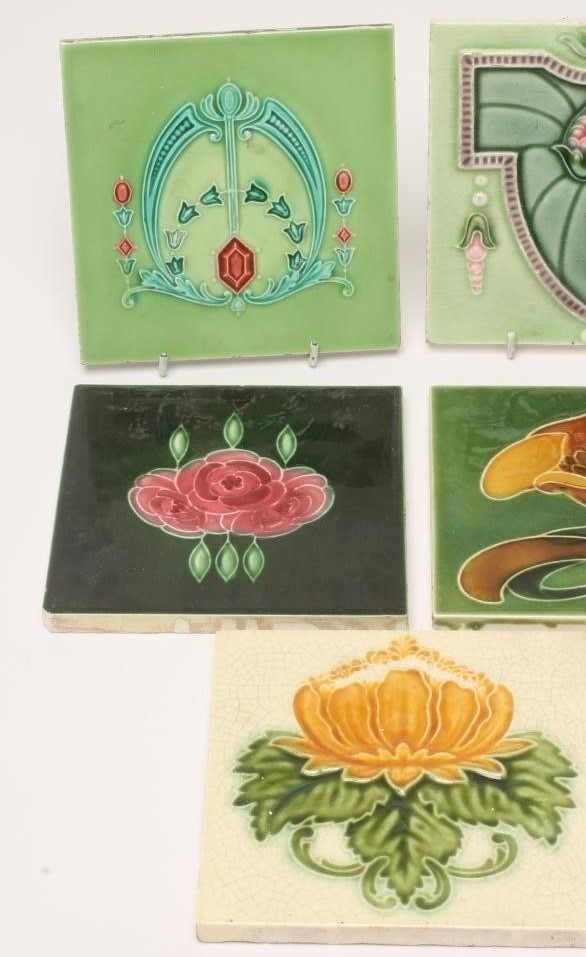 A COLLECTION OF ELEVEN ART NOUVEAU TILES Image