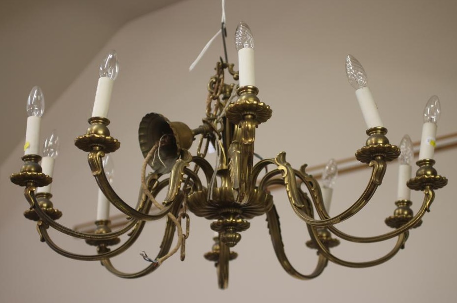 A BRASS CHANDELIER Image