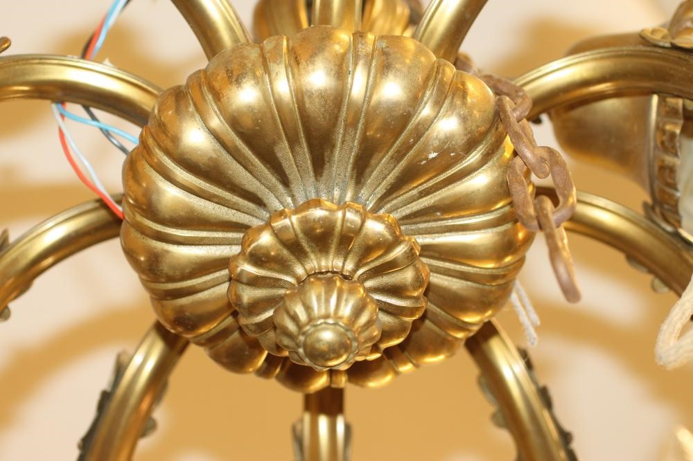 A BRASS CHANDELIER Image