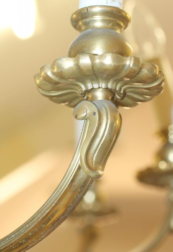 A BRASS CHANDELIER Image