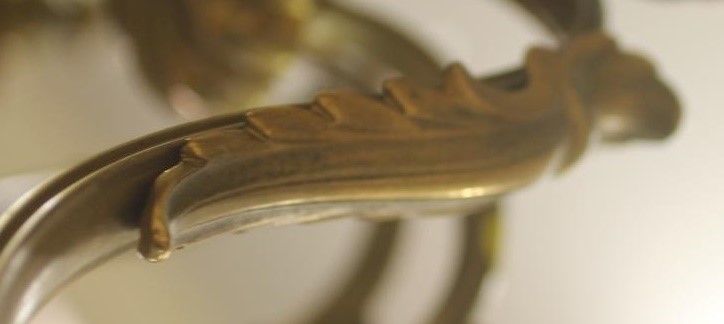 A BRASS CHANDELIER Image