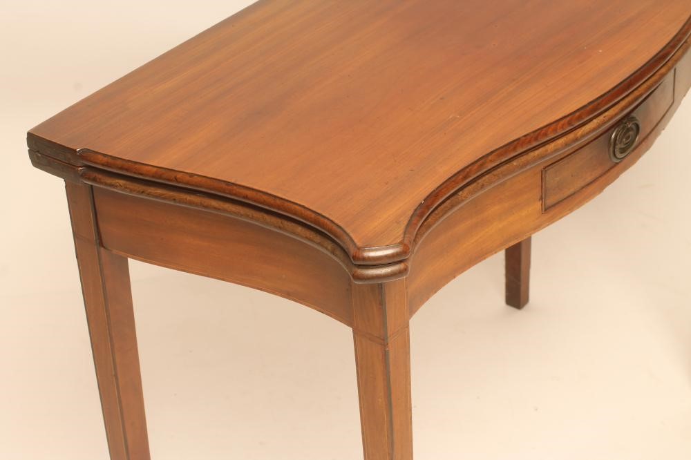 A GEORGIAN MAHOGANY FOLDING TEA TABLE Image