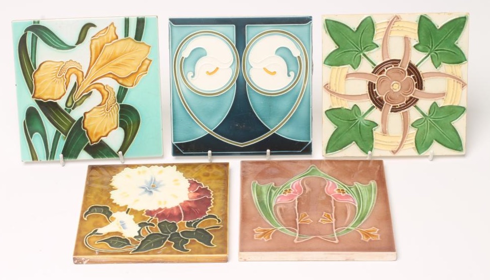 A COLLECTION OF FIVE JUGENDSTIL TILES including a Servais Werke Ag Ehrang red and white flower Image