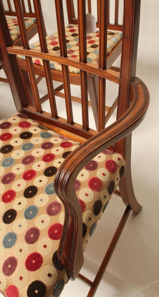 A SET OF SIX MAHOGANY DINING CHAIRS including two elbow chairs Image