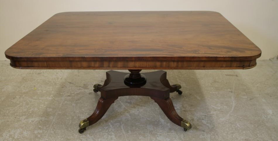A REGENCY MAHOGANY BREAKFAST TABLE Image