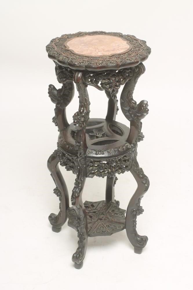 A CHINESE PADOUK WOOD JARDINIERE STAND Image