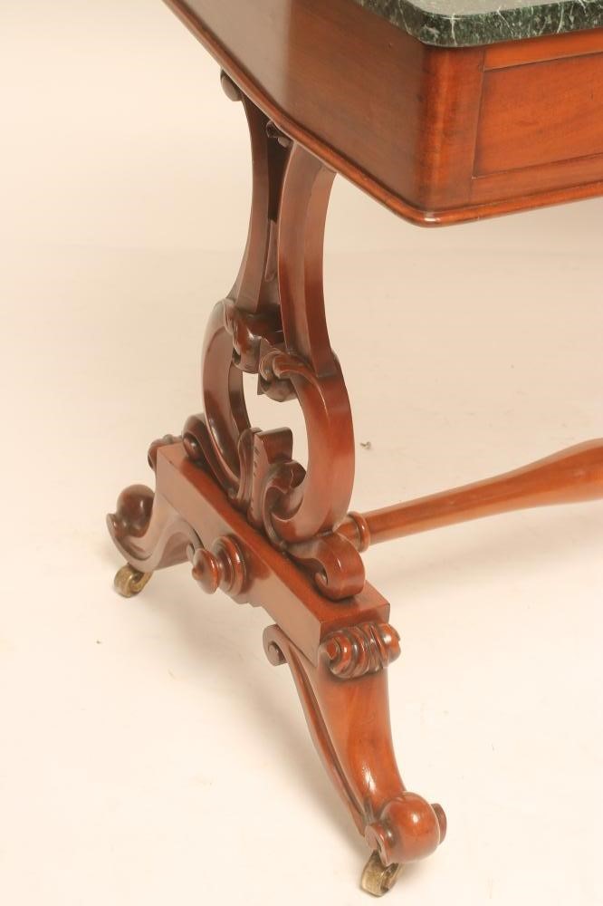 A VICTORIAN MAHOGANY SIDE TABLE of shaped oblong form with green marble top Image