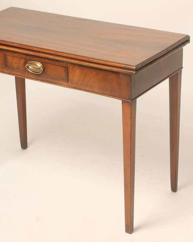 A GEORGIAN MAHOGANY FOLDING TEA TABLE Image