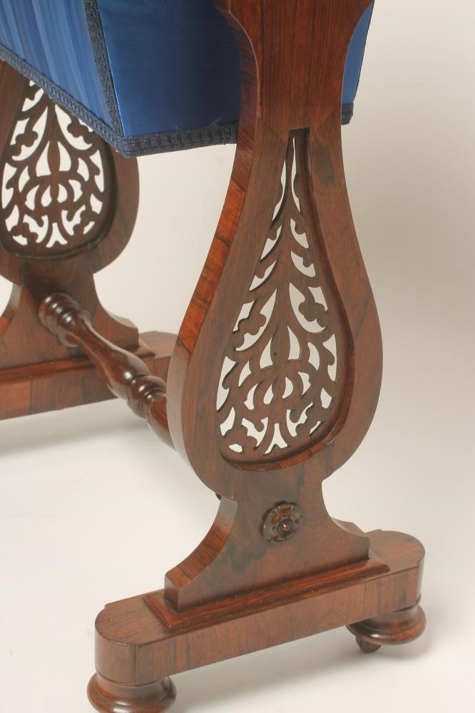 A VICTORIAN ROSEWOOD WORK/GAMES TABLE Image