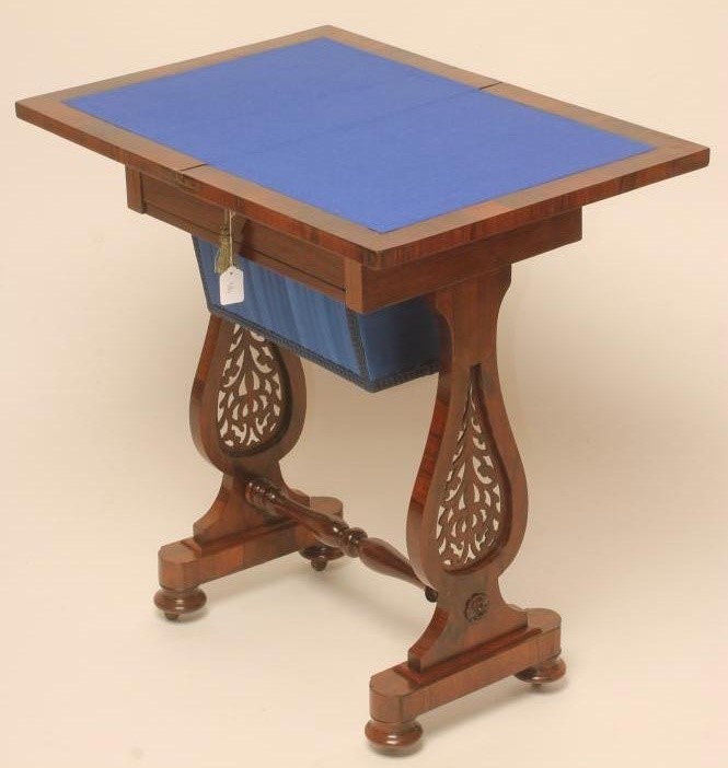 A VICTORIAN ROSEWOOD WORK/GAMES TABLE Image