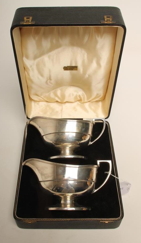 A PAIR OF LARGE SILVER SAUCEBOATS Image