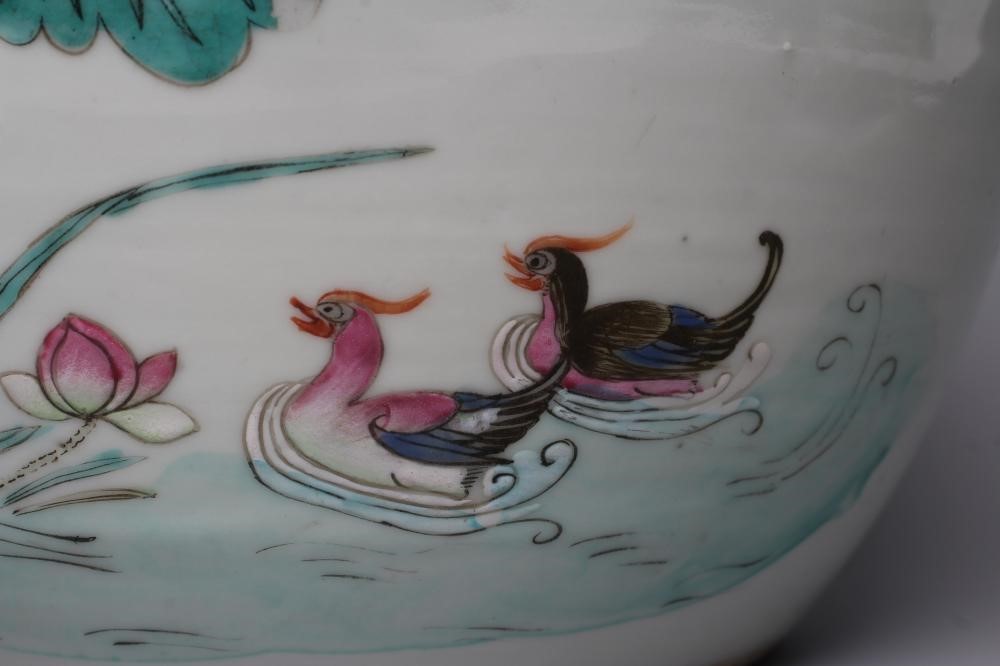 A CHINESE PORCELAIN JAR AND COVER of rounded cylindrical form Image