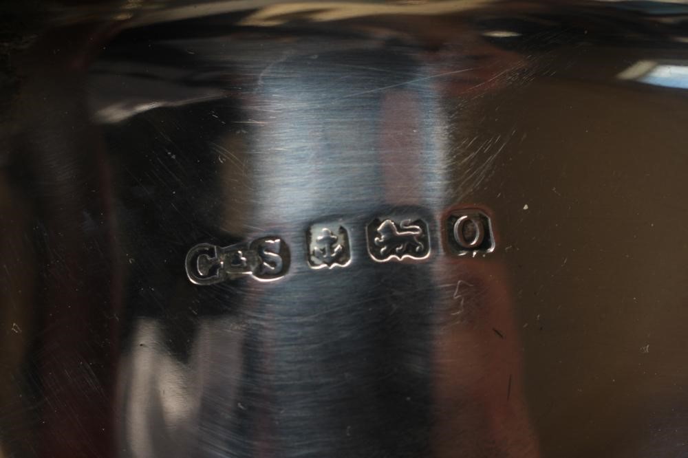 A SILVER THREE PIECE TEA SERVICE Image