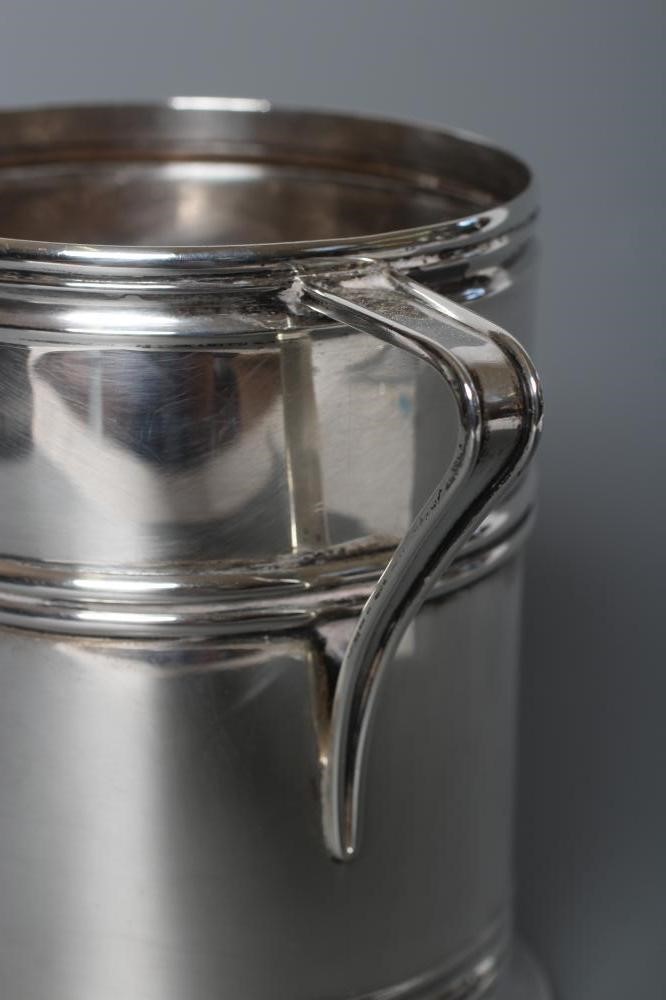 A SILVER SYPHON HOLDER Image