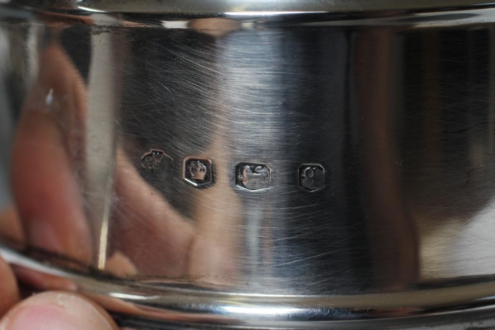 A SILVER SYPHON HOLDER Image