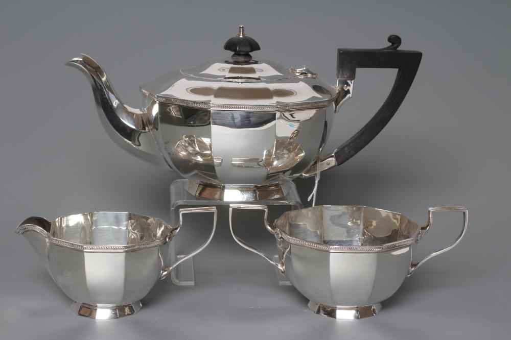 A SILVER THREE PIECE TEA SERVICE Image