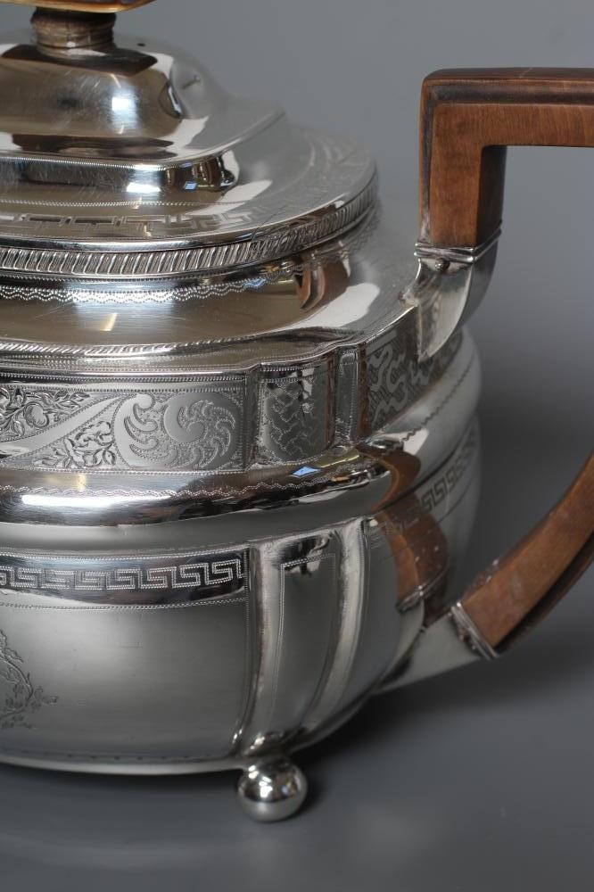A GEORGE III SILVER TEAPOT Image