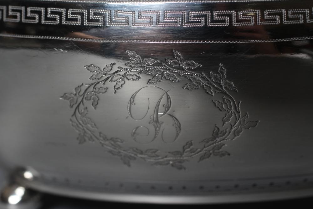 A GEORGE III SILVER TEAPOT Image