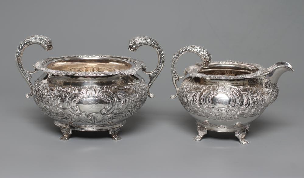 A LATE GEORGE III IRISH SILVER MILK JUG AND SUGAR BOWL Image