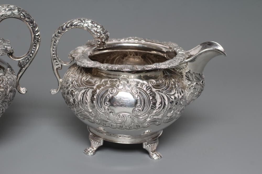 A LATE GEORGE III IRISH SILVER MILK JUG AND SUGAR BOWL Image
