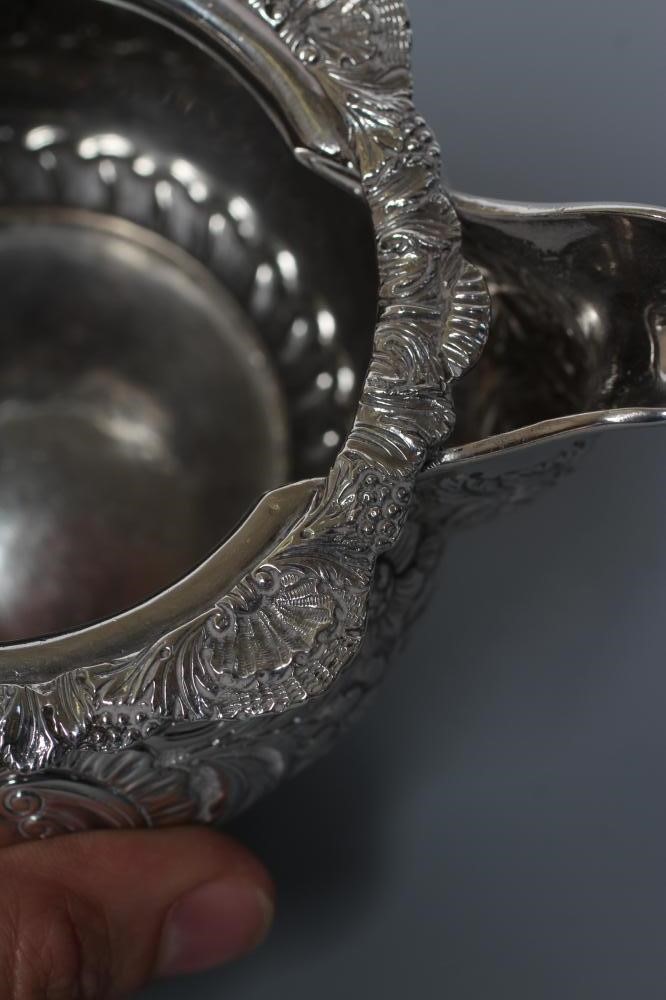 A LATE GEORGE III IRISH SILVER MILK JUG AND SUGAR BOWL Image