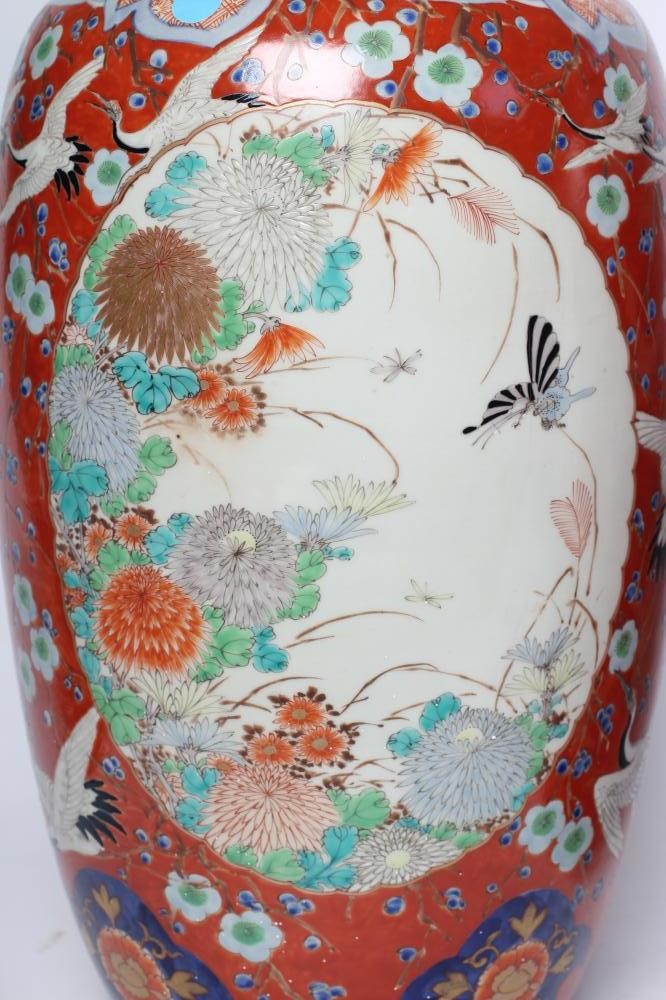 A PAIR OF IMARI PORCELAIN VASES of rounded cylindrical form Image