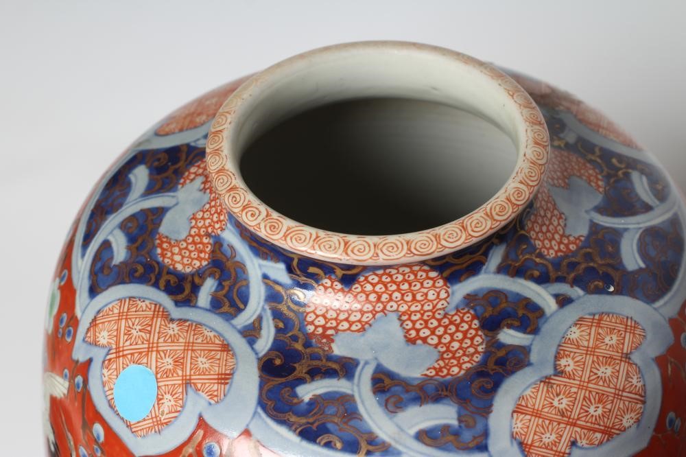 A PAIR OF IMARI PORCELAIN VASES of rounded cylindrical form Image