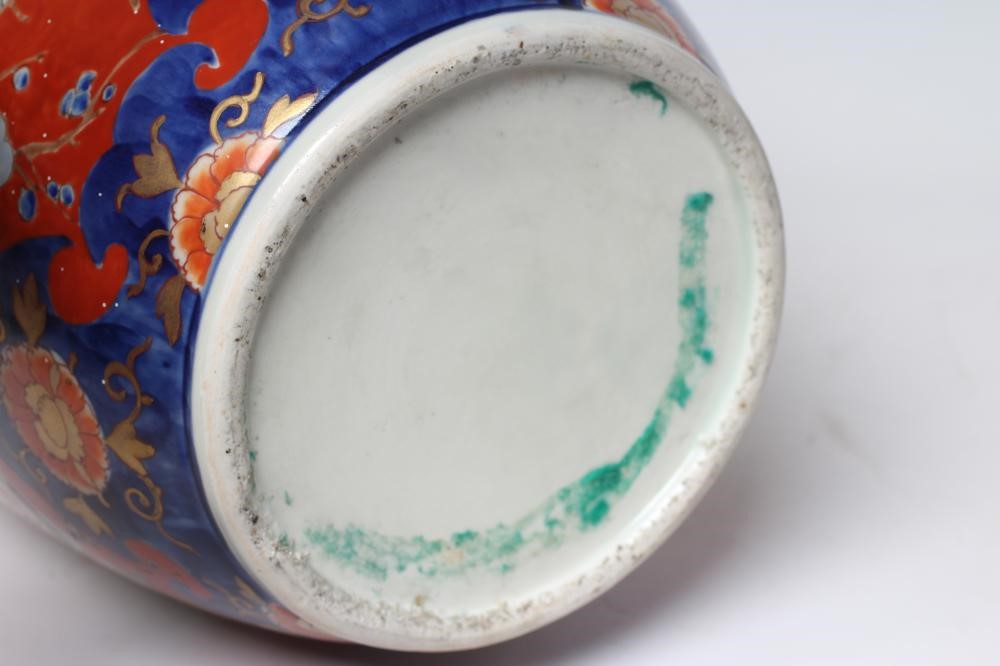 A PAIR OF IMARI PORCELAIN VASES of rounded cylindrical form Image