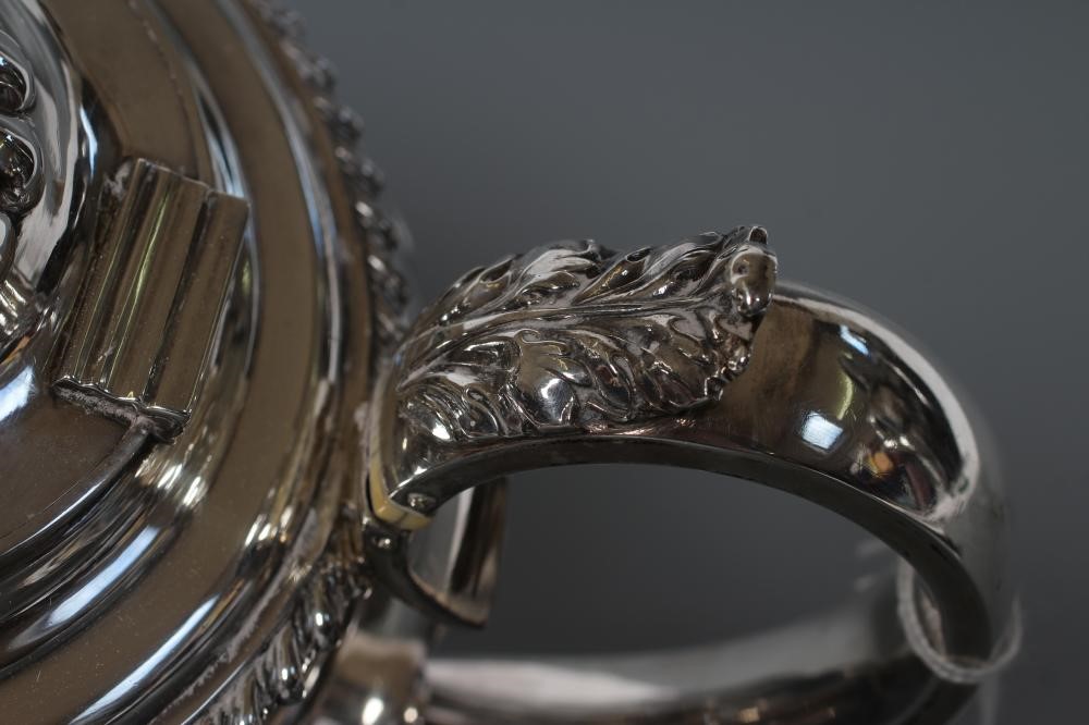 A GEORGE IV SILVER TEAPOT Image