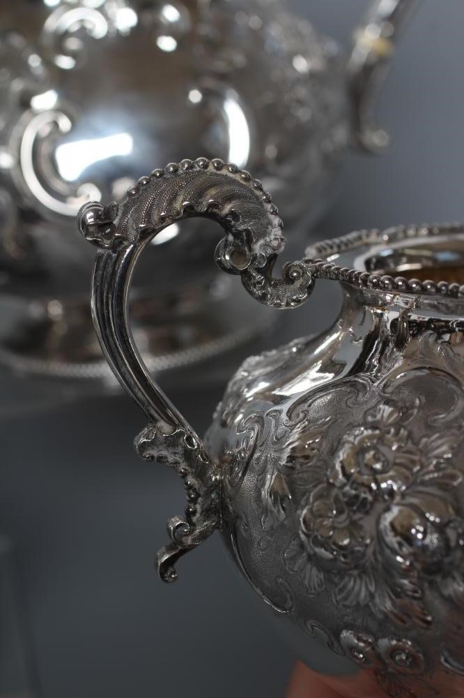 A VICTORIAN SILVER FOUR PIECE TEA AND COFFEE SERVICE Image