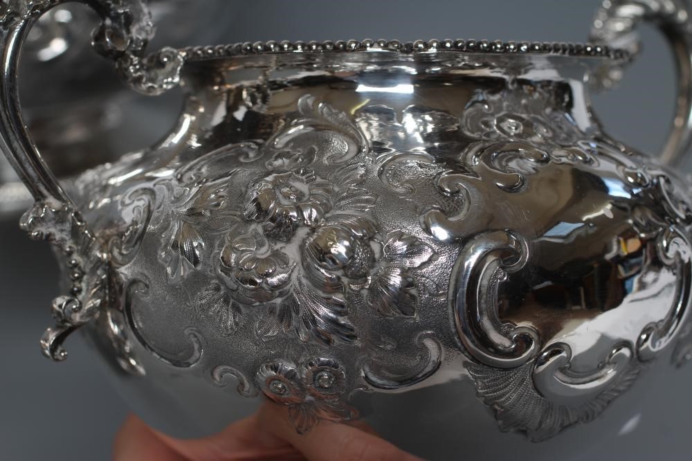 A VICTORIAN SILVER FOUR PIECE TEA AND COFFEE SERVICE Image