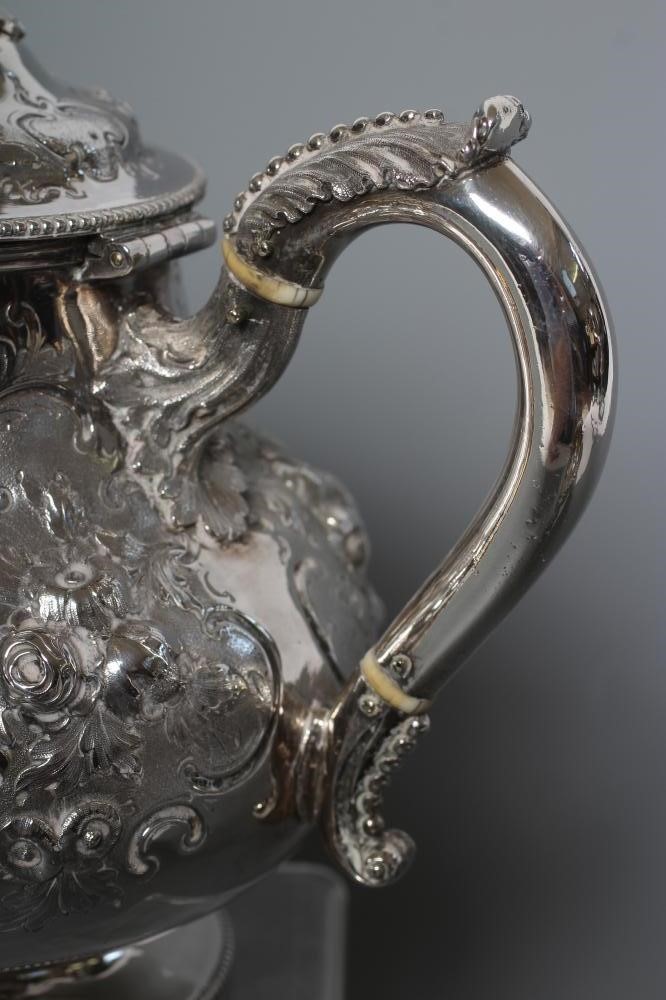 A VICTORIAN SILVER FOUR PIECE TEA AND COFFEE SERVICE Image