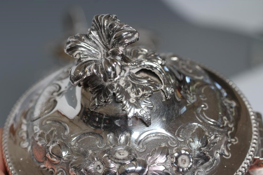 A VICTORIAN SILVER FOUR PIECE TEA AND COFFEE SERVICE Image