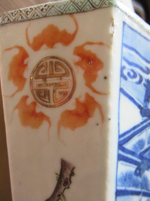 A CHINESE PORCELAIN VASE of swept octagonal form with two scrolling handles Image