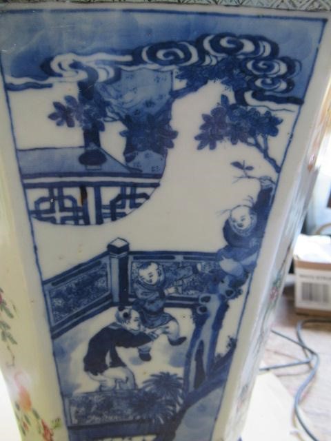 A CHINESE PORCELAIN VASE of swept octagonal form with two scrolling handles Image