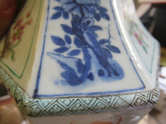 A CHINESE PORCELAIN VASE of swept octagonal form with two scrolling handles Image