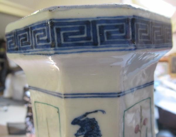 A CHINESE PORCELAIN VASE of swept octagonal form with two scrolling handles Image