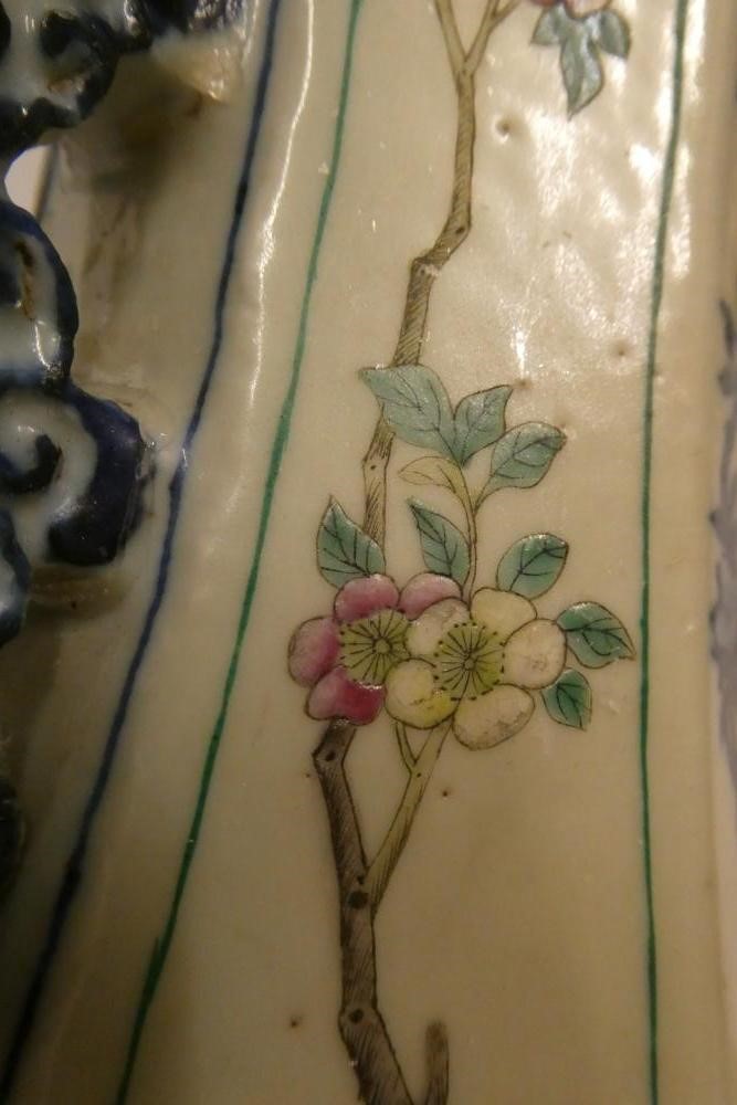 A CHINESE PORCELAIN VASE of swept octagonal form with two scrolling handles Image