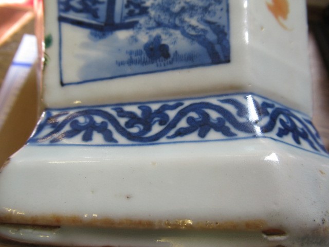 A CHINESE PORCELAIN VASE of swept octagonal form with two scrolling handles Image