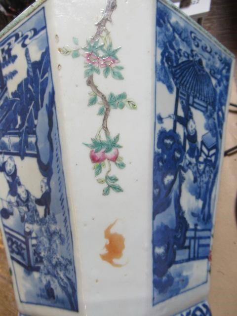 A CHINESE PORCELAIN VASE of swept octagonal form with two scrolling handles Image