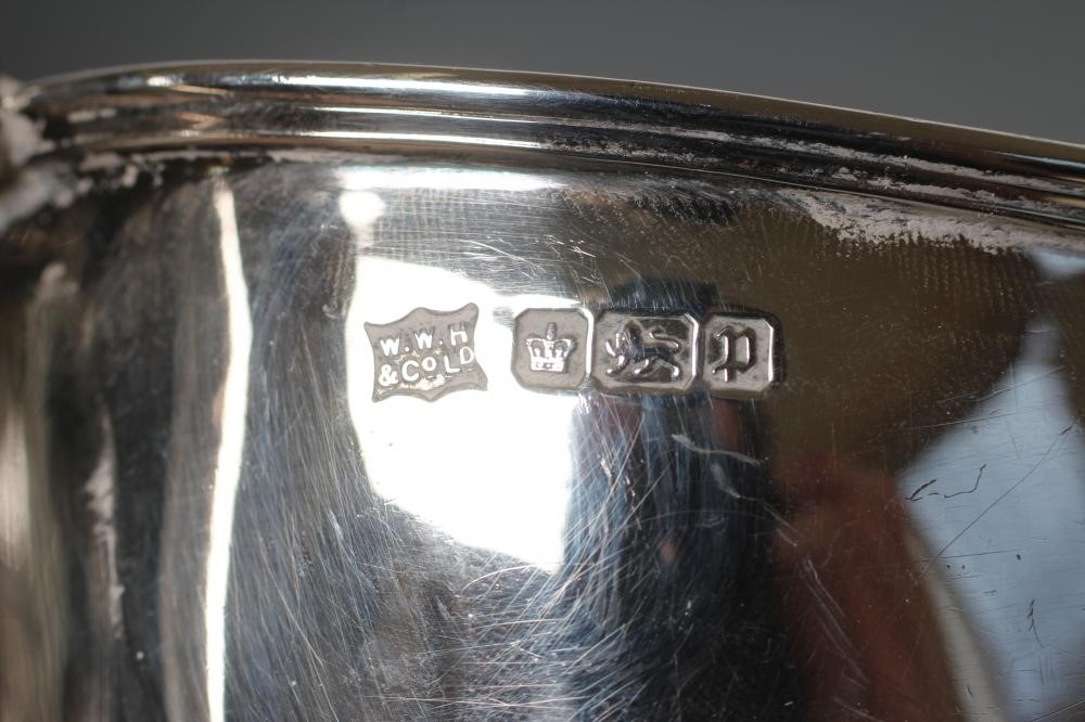 AN EDWARDIAN SILVER COMPOSITE THREE PIECE TEA SERVICE Image