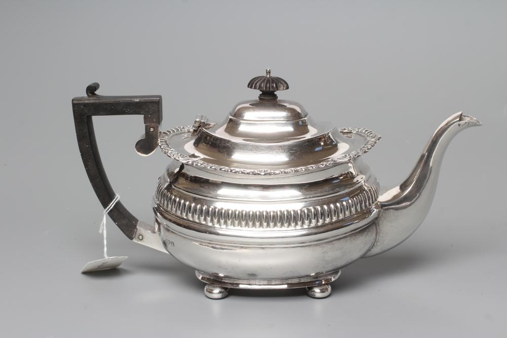 AN EDWARDIAN SILVER TEAPOT Image