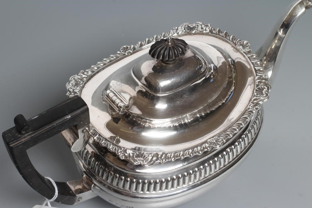 AN EDWARDIAN SILVER TEAPOT Image